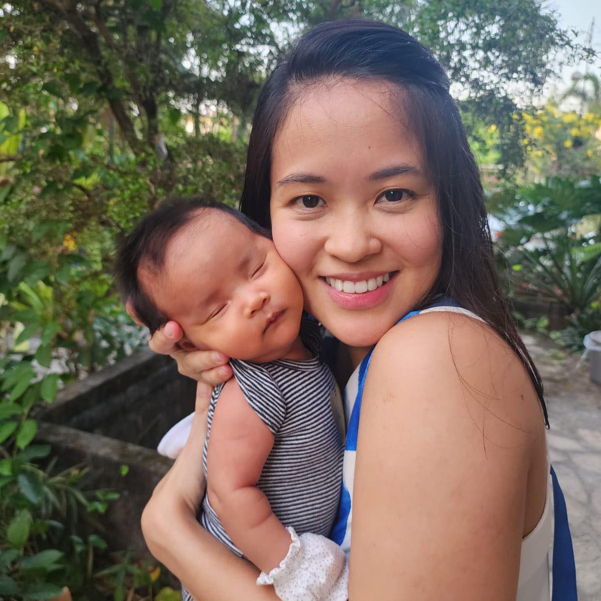 Dr Erin and her baby girl with big smile